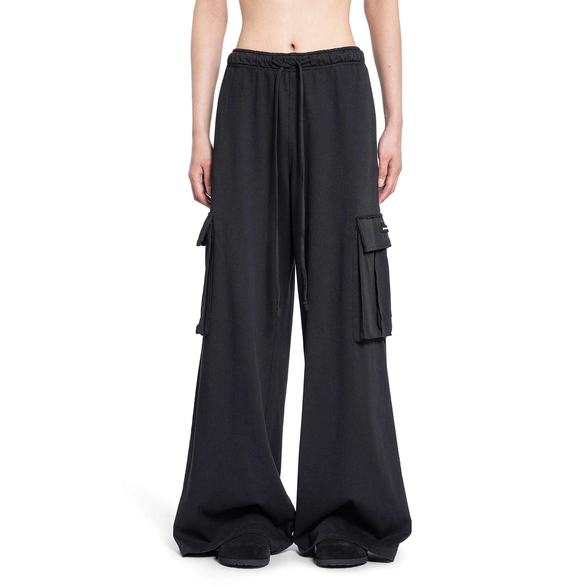 PALM ANGELS MAN BLACK TROUSERS